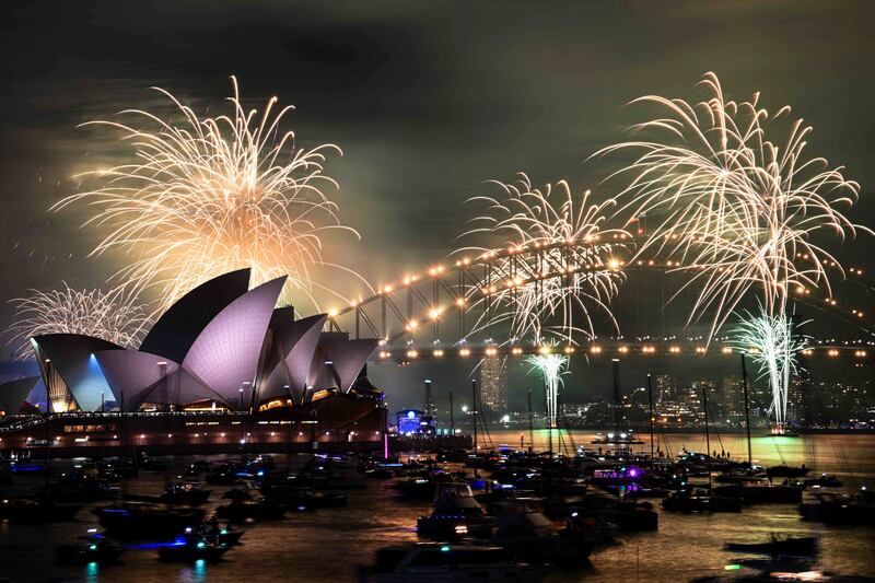 Fireworks explode over Sydney Harbour ahead of New Year’s Eve celebrations in Sydney (Bianca De Marchi/AAP via AP)