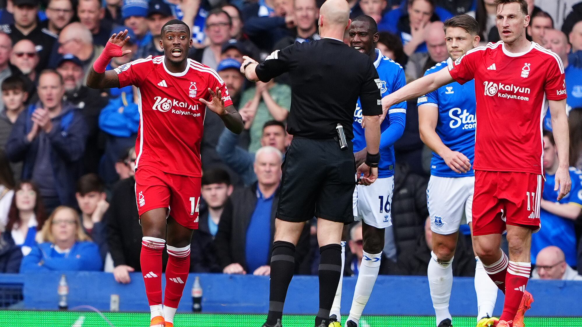 Callum Hudson-Odoi, left, appeals for a penalty for Forest against Everton