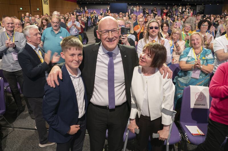 SNP leader and Scottish First Minister John Swinney with his wife Elzabth – who he paid tribute to in his speech – and his son Matthew.