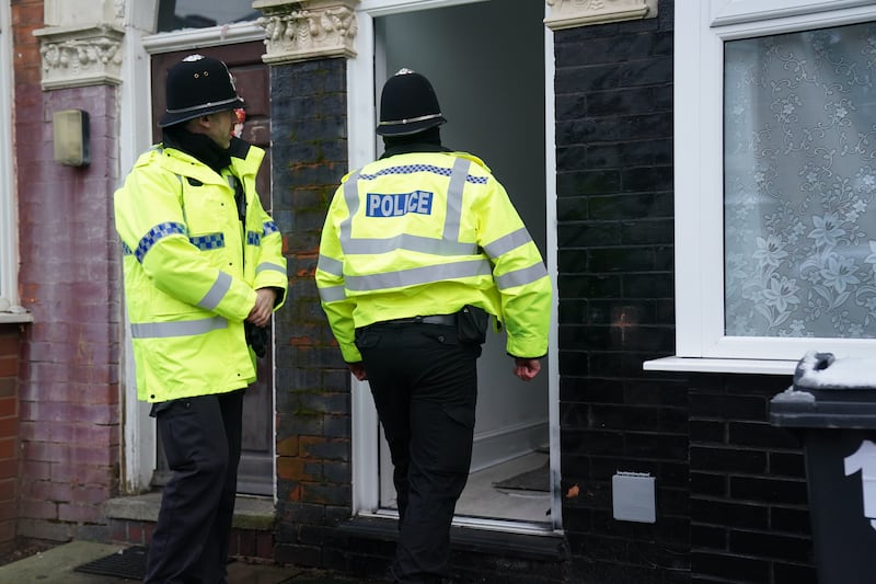 Police outside the couple’s Handsworth property