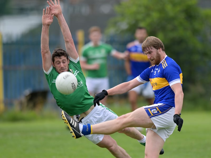 Stephen Beatty kicks ball