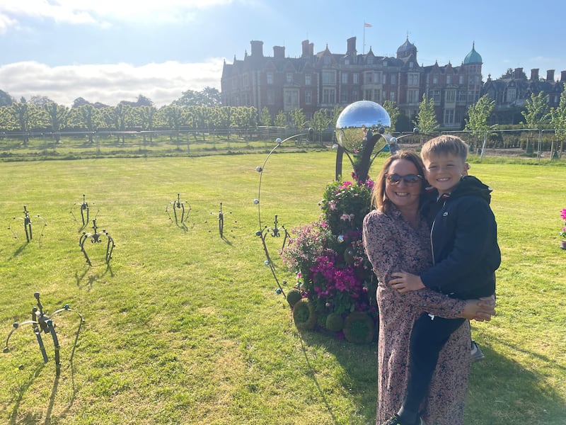 Victoria Osborne and her son Lochlan with crowns that her firm L V Bespoke made for the Sandringham Estate.