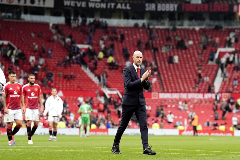 Erik ten Hag applauds the remaining fans as Old Trafford quickly empties at the end of this season’s 3-0 defeat to Liverpool