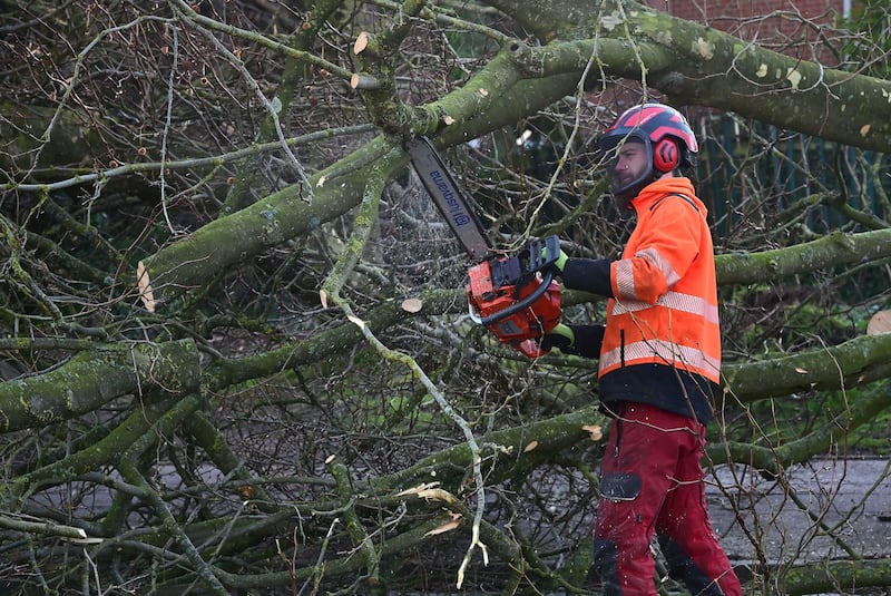 The Storm Éowyn clear up operation under way in Belfast on Saturday. PICTURE MAL McCANN