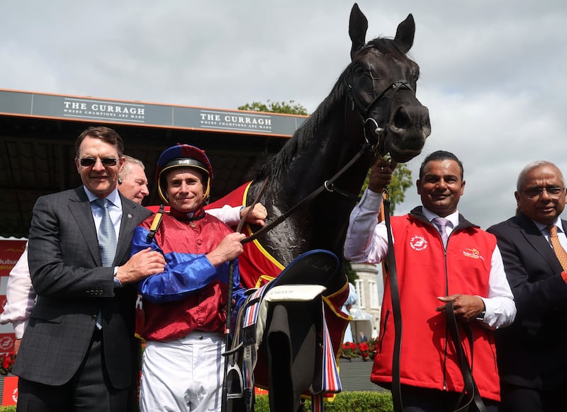 Aidan O'Brien and Ryan Moore after winning the Dubai Duty Free Irish Derby with Los Angeles during day three of the Dubai Duty Free Irish Derby Festival at The Curragh Racecourse, Dublin. Picture date: Sunday June 30, 2024.