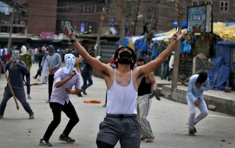 Stone pelters clash with police during disturbances in Srinagar, Kashmir, India, 2017. Picture by Cathal McNaughton