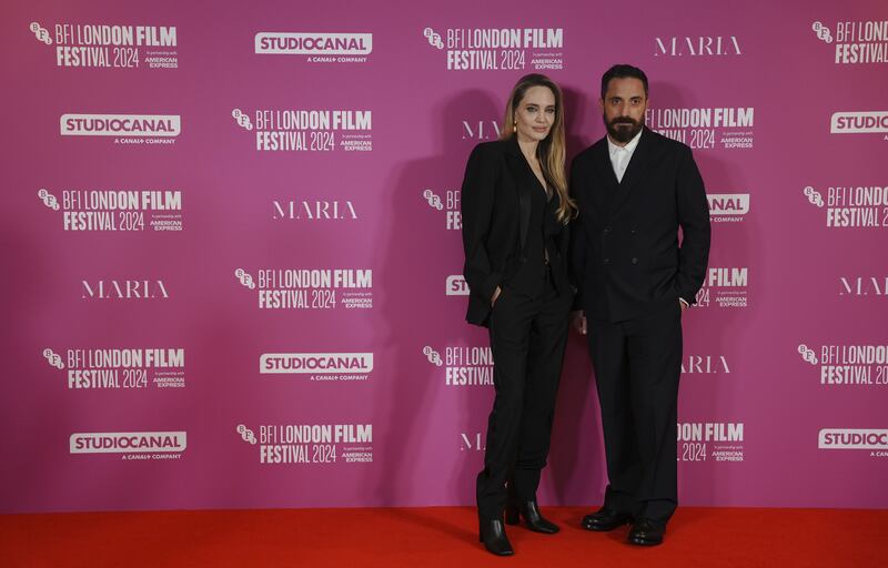 Angelina Jolie and Pablo Larrain attend a London Film Festival gala screening of Maria at the Royal Festival Hall, Southbank Centre