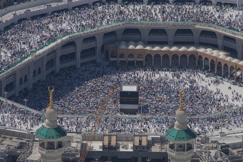 Muslim pilgrims circle the Kaaba, the cubic building at the Grand Mosque, during the annual Hajj pilgrimage in Mecca (Rafiq Maqbool/AP)