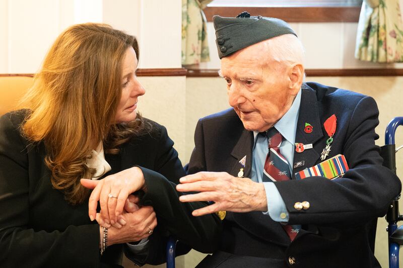 D-Day veteran Bernard Morgan, 98, right, sat alongside Education Secretary Gillian Keegan during the event