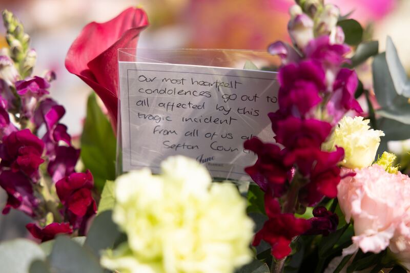 Messages and floral tributes near the scene in Hart Street, Southport