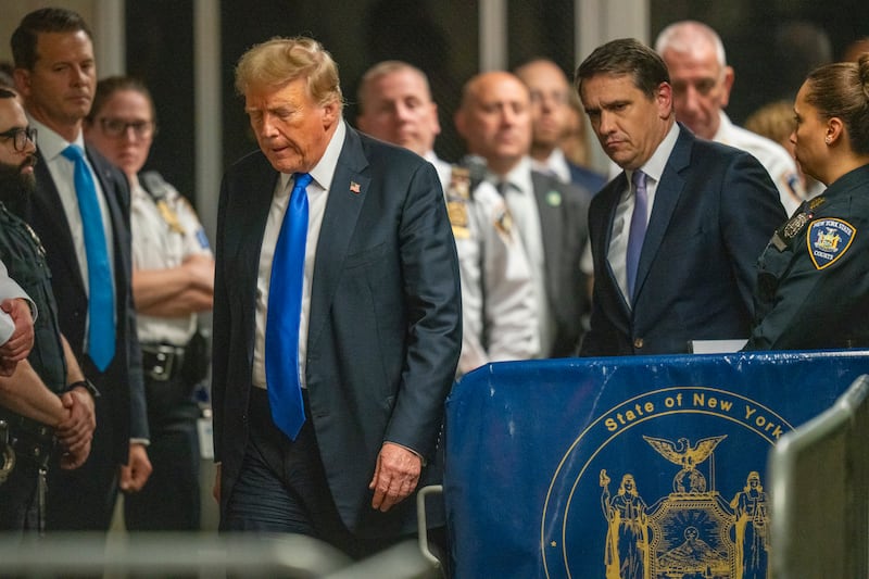 Donald Trump walks outside Manhattan Criminal Court after the verdicts (Steven Hirsch/New York Post/AP)