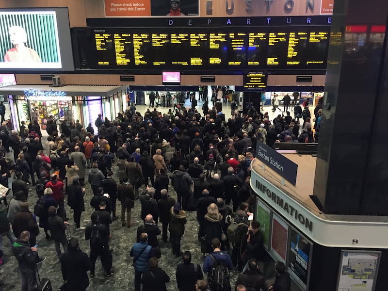 Passengers crowd the concourse at Euston station