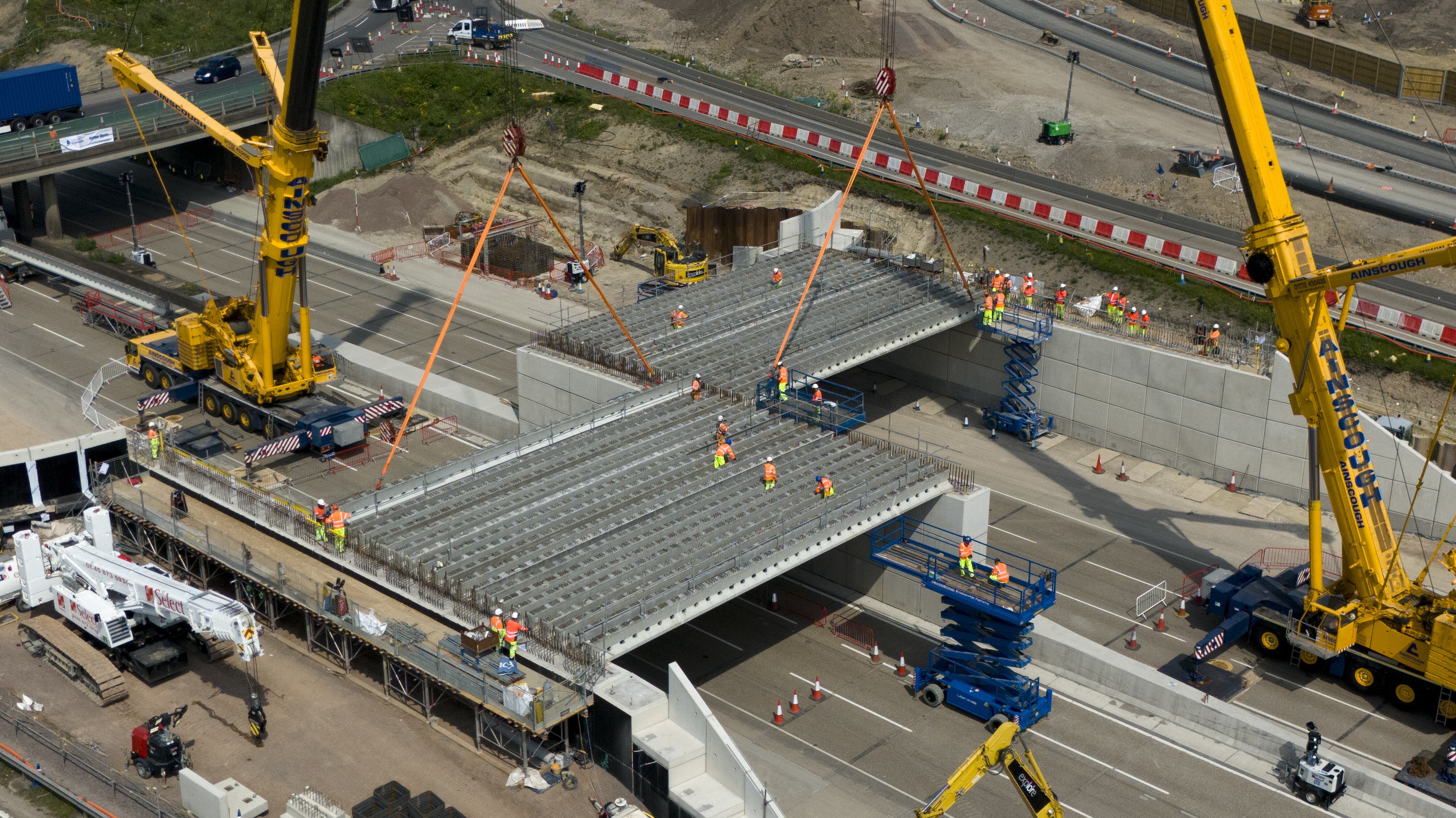 Engineering works taking place at the A3 Wisley interchange at Junction 10 of the M25 as concrete beams for a new bridge are installed