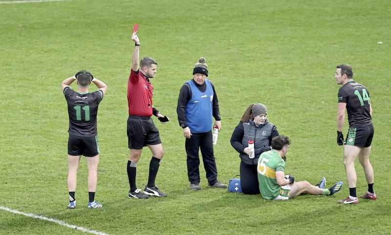 Tomas McCann (left) of Cargin couldn&#39;t believe it when the referee issued a red for a tackle on Glen&#39;s Conleith McGuckian Picture Margaret McLaughlin. 