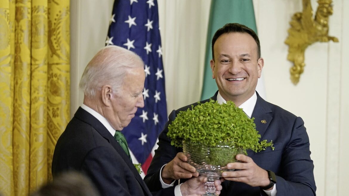 Taoiseach Leo Varadkar presents US President Joe Biden with a bowl of shamrock at the White House on St Patrick's Day