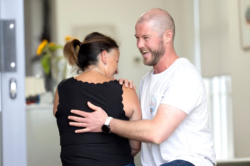 Mark Mullan in a chiropractic session with a patient