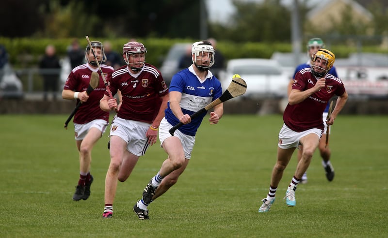 5/10/2024  St Johns     Michael Dudley    in action with   Ruairi Ogs    Martin Burke  and  Fred Mc Curry    in Saturdays Semi Final game at  Dunloy   Picture  Seamus  Loughran