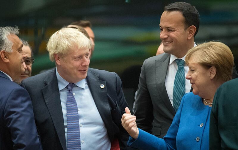 British prime minister Boris Johnson (centre left) with Taoiseach Leo Varadkar (2nd right) and Chancellor of Germany Angela Merkel at a round table for the European Council summit at EU headquarters in Brussels&nbsp;