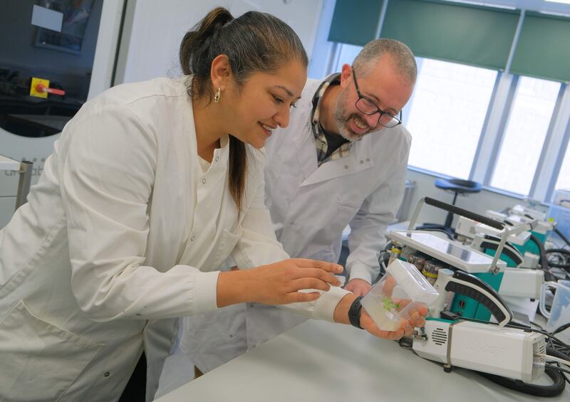 Dr Pallavi Singh and Dr Nick Aldred in the lab as they research whether mistletoe could be used as a surgical glue.