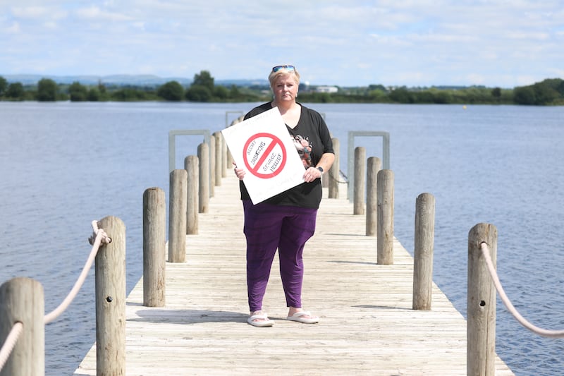 Environmental campaigners hold a protest at Oxford Island, Lough Neagh. Picture: MAL MCCANN