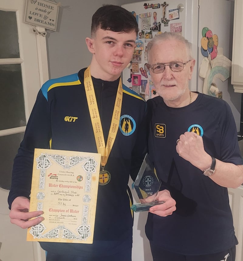 Jamie Graham celebrates his Ulster title success with granda Paddy