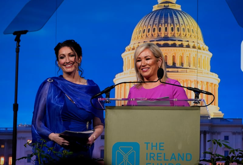First Minister Michelle O'Neill and Deputy First Minister Emma Little-Pengelly
behind a lectern at the Ireland Funds 32nd National Gala at the National Building Museum in Washington DC