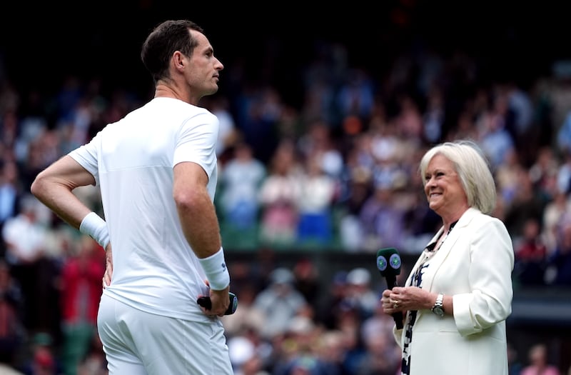 Andy Murray with Sue Barker following his gentlemen’s doubles match with Jamie Murray on day four of the 2024 Wimbledon Championships