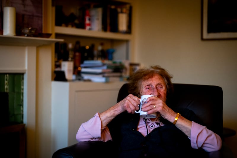 Holocaust survivor Susan Pollack drinks tea from a commemorative Prince and Princess of Wales wedding mug in her north London home during an interview with the PA news agency ahead of Holocaust Memorial Day. Picture date: Wednesday January 15, 2025. PA Photo. See PA story MEMORIAL Holocaust Pollack. Photo credit should read: Jordan Pettitt/PA Wire