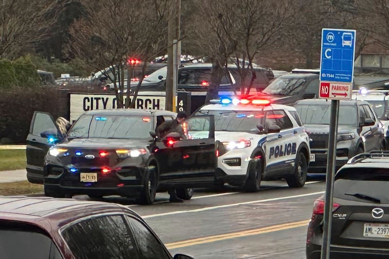 Emergency vehicles parked outside the Abundant Life Christian School in Madison (Scott Bauer/AP)