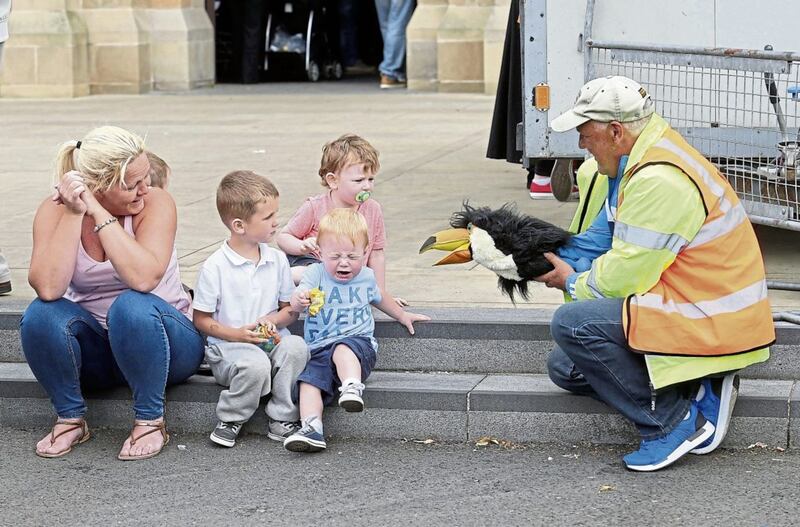 Hundreds of volunteers - including those who try to keep the children entertained - help make the Clonard Novena work so efficiently. Picture by Mal by McCann