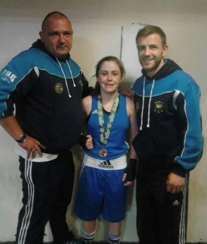 The late Gerard McParland with Immaculata coach Martin Lindsay and boxer Caitlin Fryers