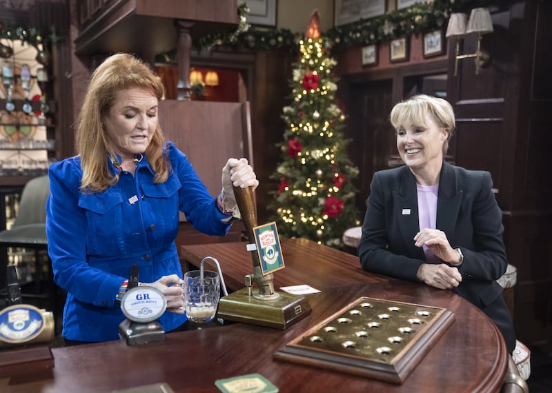 The duchess pours a pint for Sally Dynevor in the Rovers Return