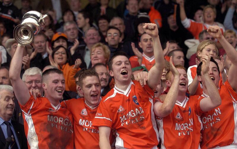 Armagh U21 skipper Ciaran McKeever celebrates with his team-mates after the Orchard County beat Mayo to win the All-Ireland title