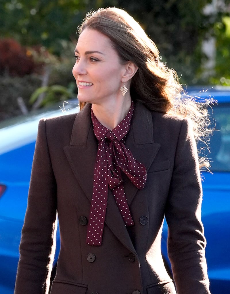 Kate wore a plum polka dot pussy-bow blouse in early October