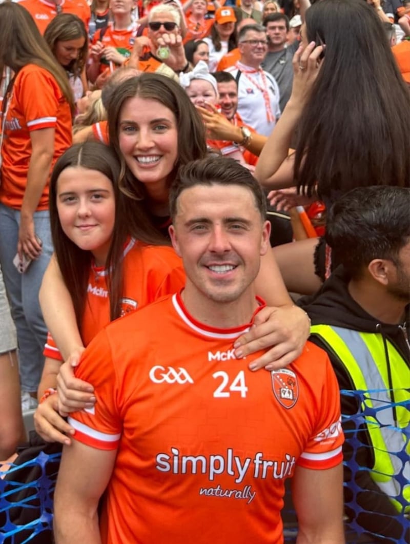 Stefan Campbell with daughter Ella and partner Maria after Armagh's All-Ireland victory