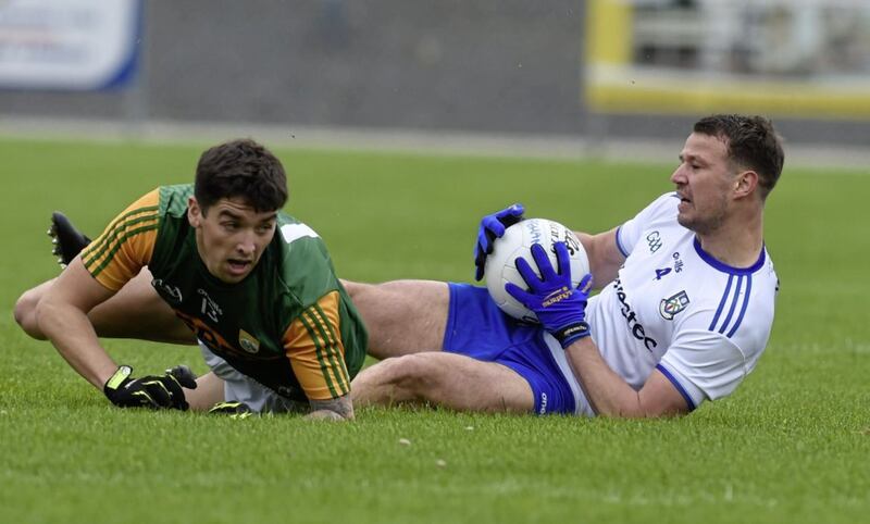 Tony Brosnan of Kerry tackles Monaghan captain Ryan Wylie in the Allianz Football League Division One clash at Inniskeen on Saturday October 17 2020 