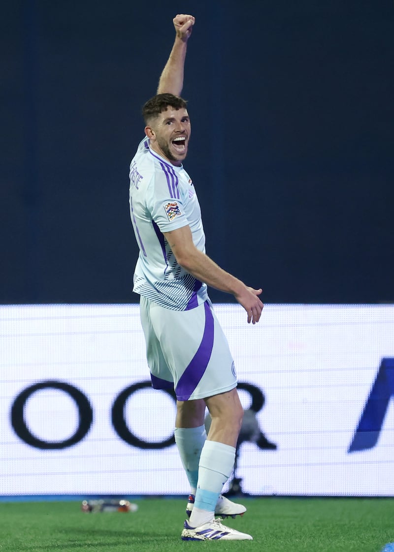 Ryan Christie celebrates scoring Scotland’s opener .