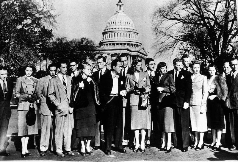 Humphrey Bogart (front, centre) with a group of film stars arrive for a session of the House Un-American Activities Committee in Washington DC