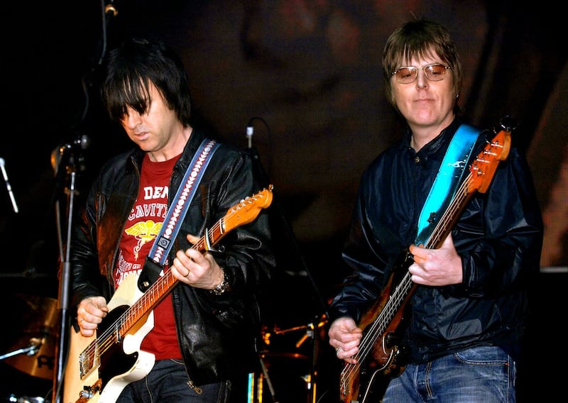 Former members of The Smiths, Andy Rourke (right) and Johnny Marr, on stage