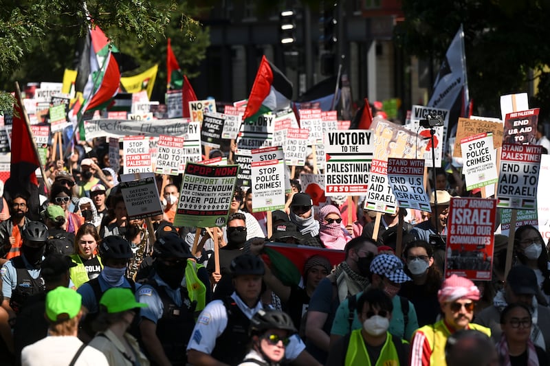 Protesters march to the Democratic National Convention after a rally at Union Park (Noah Berger/AP)