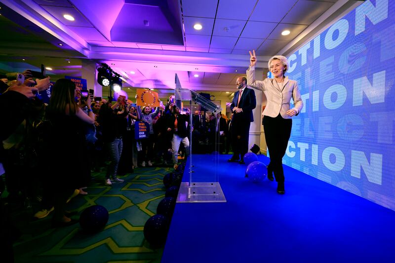 Lead candidate for the European Commission, current European Commission president Ursula von der Leyen walks on to the stage during an event at the European People’s Party headquarters in Brussels (Geert Vanden Wijngaert/AP)