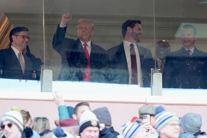 President-elect Donald Trump, centre left, Vice President-elect JD Vance, center right, House Speaker Mike Johnson, left, and Mr Trump’s choice to be defence secretary Pete Hegseth, attend the NCAA college football game (Stephanie Scarbrough/AP)