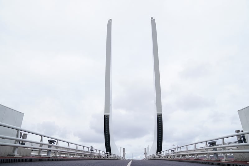 The wings of the Gull Wing Bridge in Lowestoft, Suffolk, the largest rolling bascule bridge in the world, lifted using hydraulic cylinders