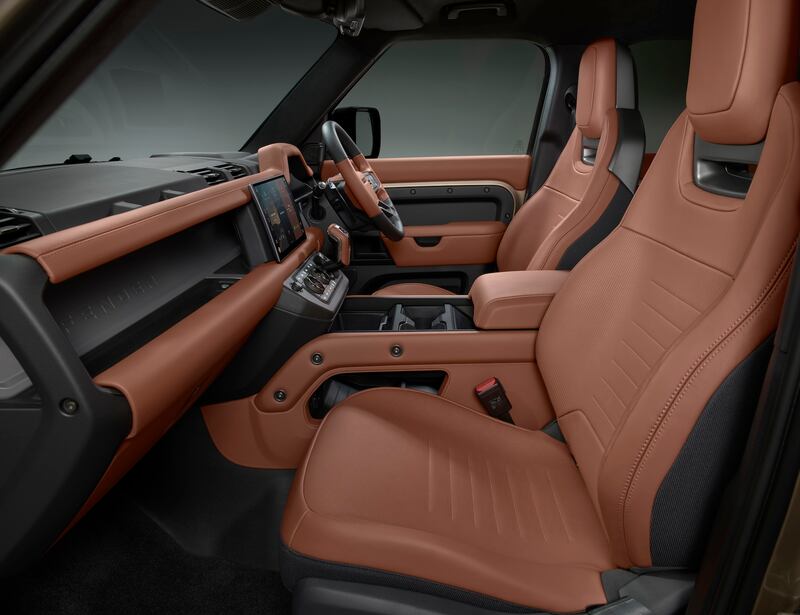 Inside, features sports seats. (Land Rover)