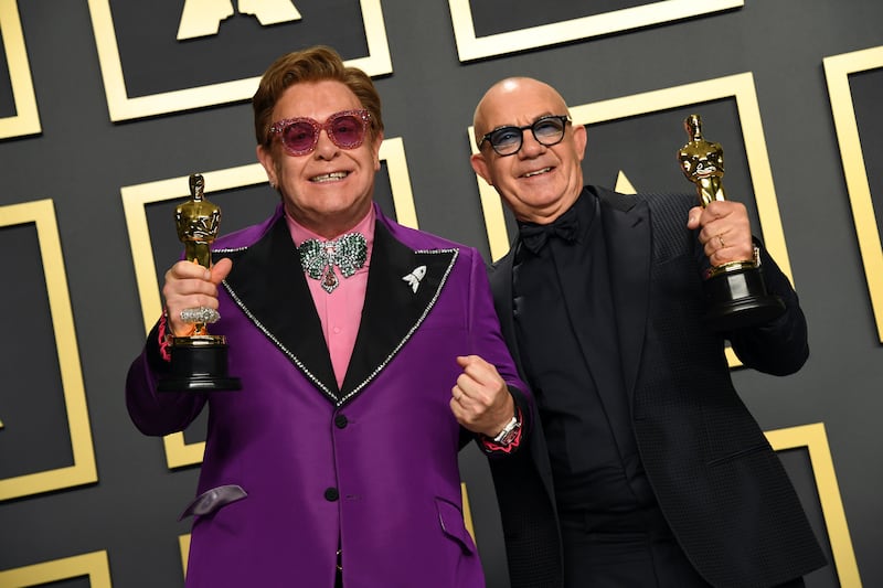 Sir Elton John and Bernie Taupin with their Best Original Song Oscar