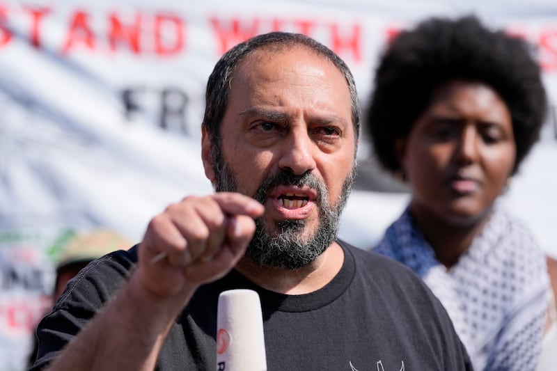 Hatem Abudayyeh, of the US Palestinian Community Network, speaks prior to a march to the Democratic National Convention (Alex Brandon/AP)