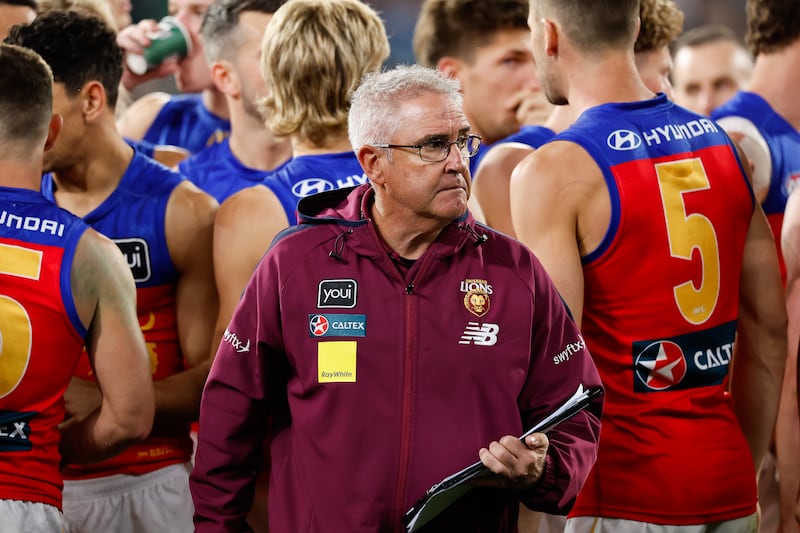 MELBOURNE, AUSTRALIA - SEPTEMBER 21: Chris Fagan, Senior Coach of the Lions looks on during the 2024 AFL Second Preliminary Final match between the Geelong Cats and the Brisbane Lions at The Melbourne Cricket Ground on September 21, 2024 in Melbourne, Australia. (Photo by Dylan Burns/AFL Photos via Getty Images)