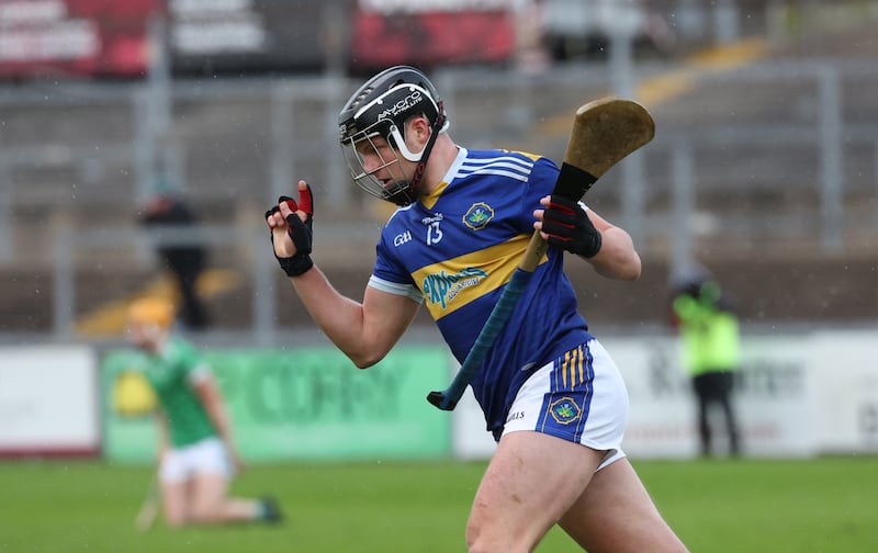 Portaferry’s Eoghan Sands  and Ballygalget’s Michael Toner during the  Down GAA Senior Hurling Championship Final at Pairs Esler on Sunday.
PICTURE COLM LENAGHAN