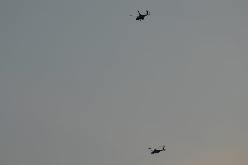 Israeli Apache helicopters fly towards northern Israel (Ariel Schalit/AP)