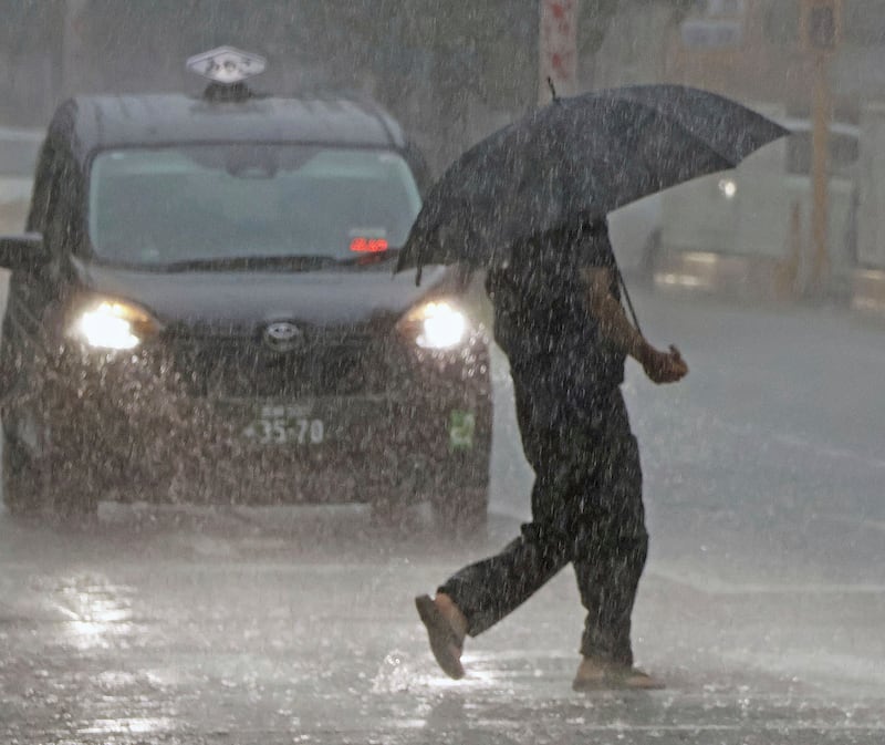 Japanese officials have issued the highest weather warnings (Kyodo News via AP)